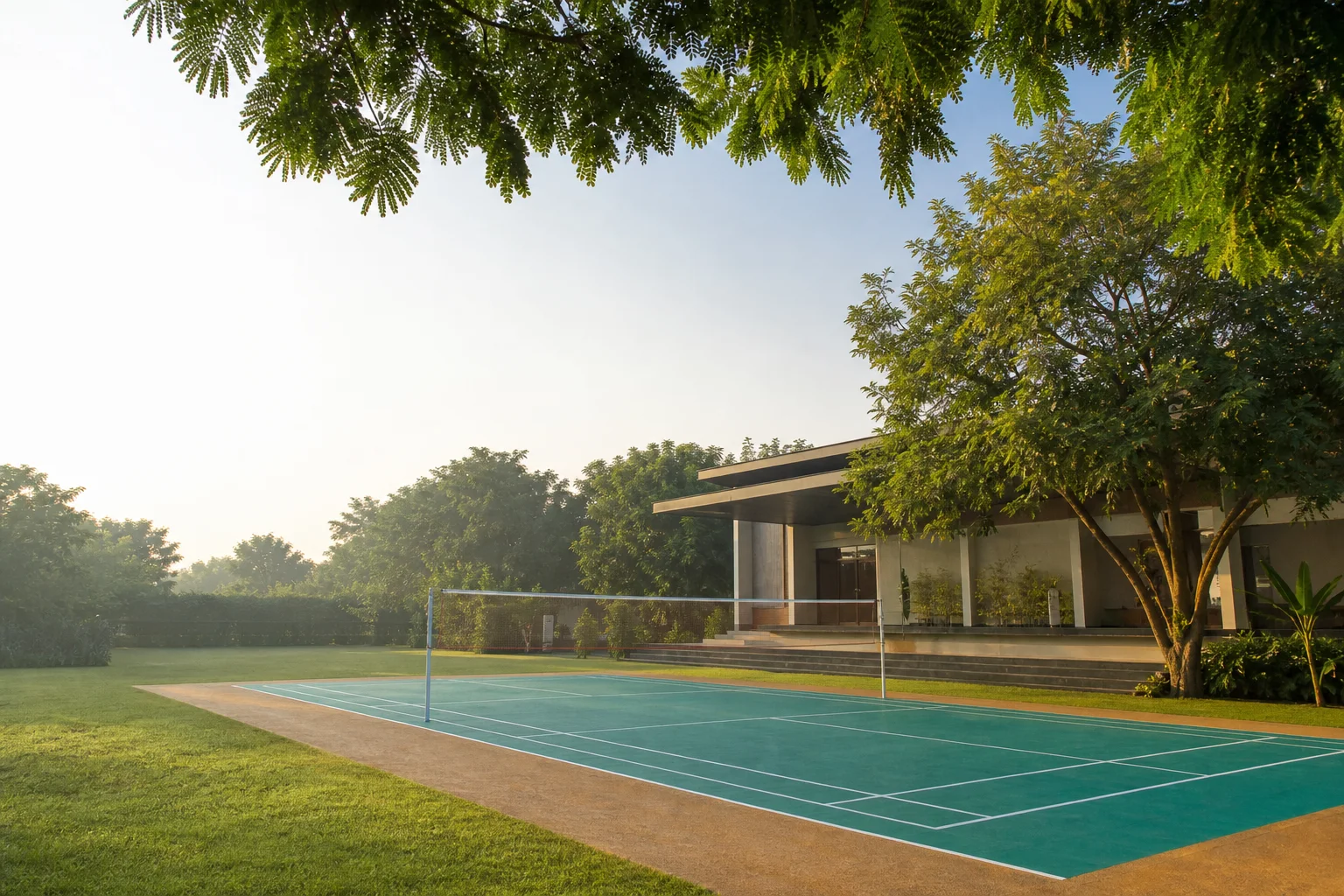 A sports court surrounded by greenery